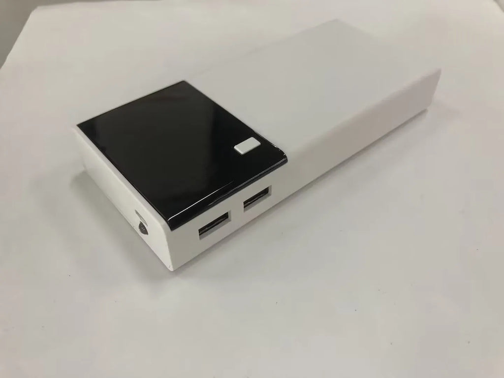 Black 20000mAh power bank with charging cable, dimensions 135mm by 60mm by 20mm