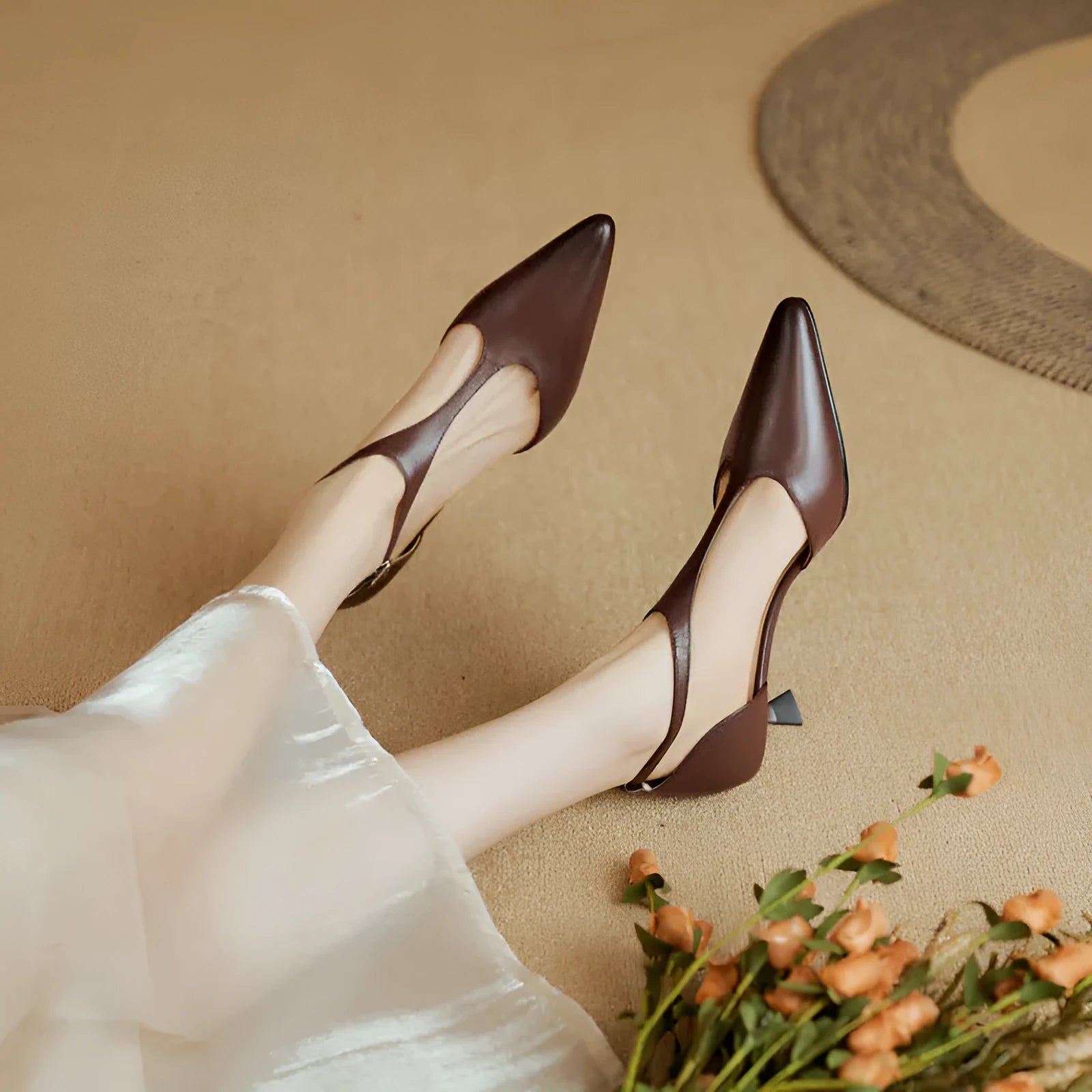Brown women's high heels with pointed toe and cowhide leather upper