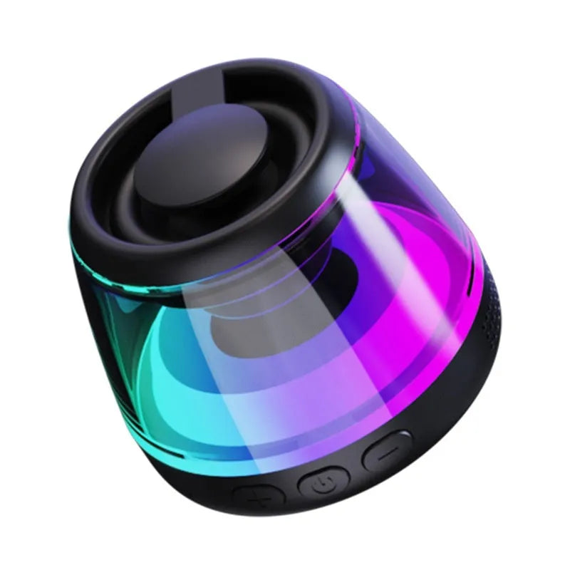 Compact white Bluetooth speaker with ambient lighting effects on metallic surface