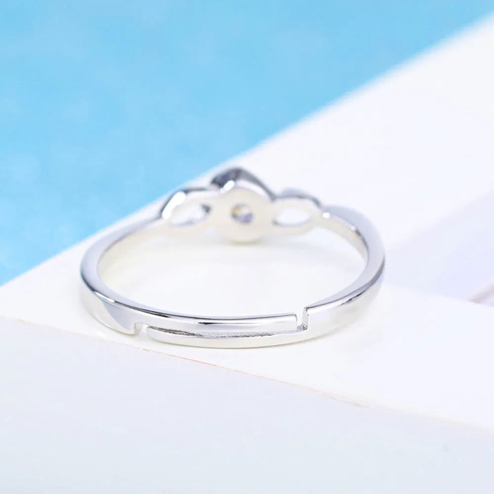 Korean style silver interwoven heart ring with adjustable opening, white diamond finish, copper base