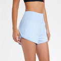 Black women's high-waist quick-dry nylon fitness shorts for running and gym workouts.