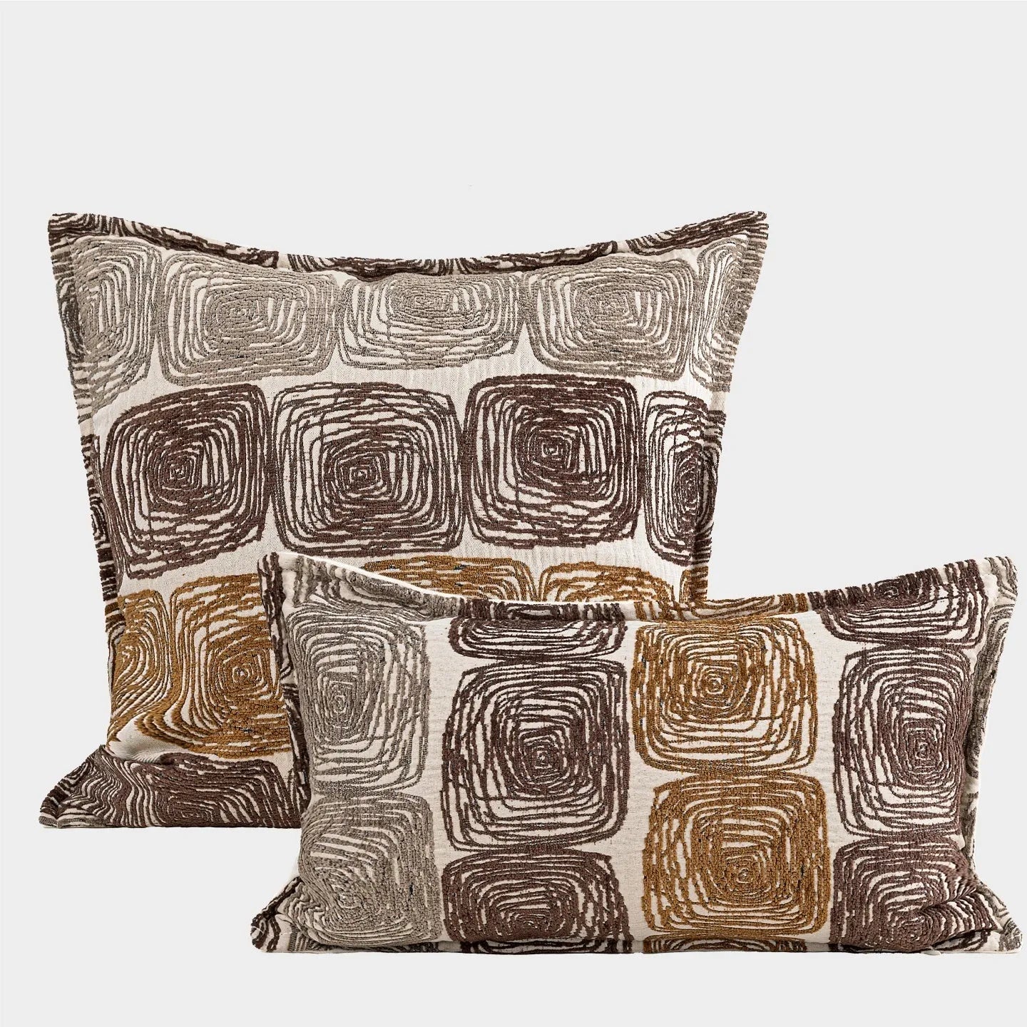 Square cushion cover with abstract coil pattern in cream and coffee colours for sofa decoration