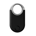 Compact black GPS tracking device for pets and children showing front display and side profile