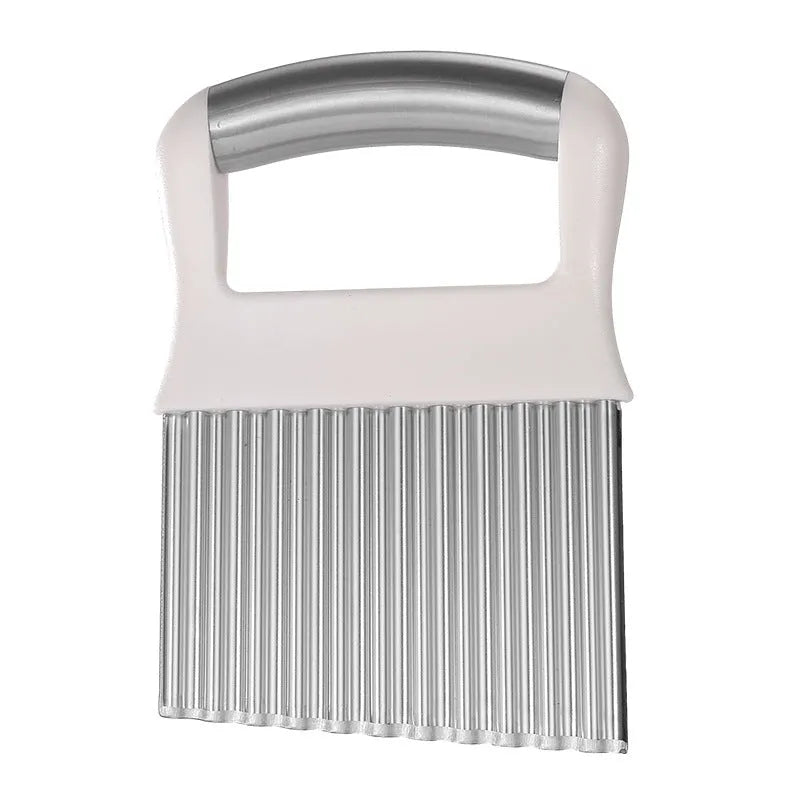 Stainless steel potato wave knife on a kitchen counter, showing its crinkle cut blade and compact 14 cm size.