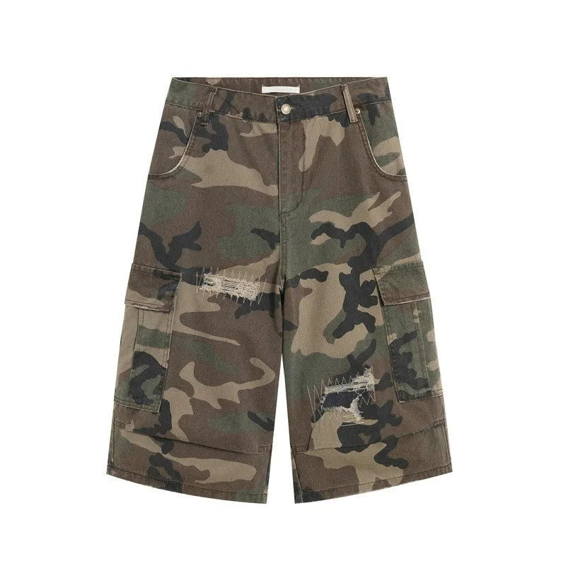 Men's camouflage cropped jeans with retro patches and ripped detailing on loose straight-leg trousers