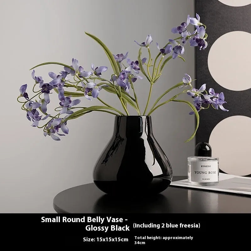 Modern black ceramic vase set with artificial white orchid flowers for home decoration
