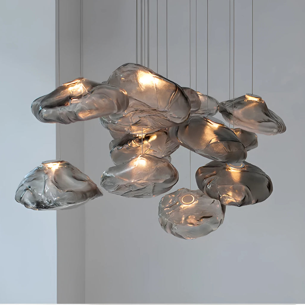 Modern glass and fabric chandelier light fixture in amber, clear or smoke grey.
