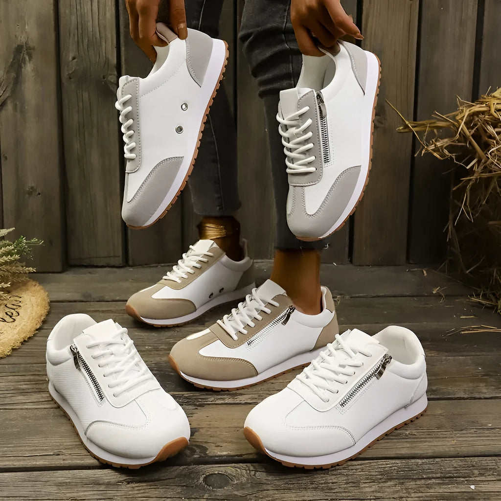 Women's flat-heeled shoes in champagne, grey, and white colours showing lightweight artificial PU uppers and rubber soles