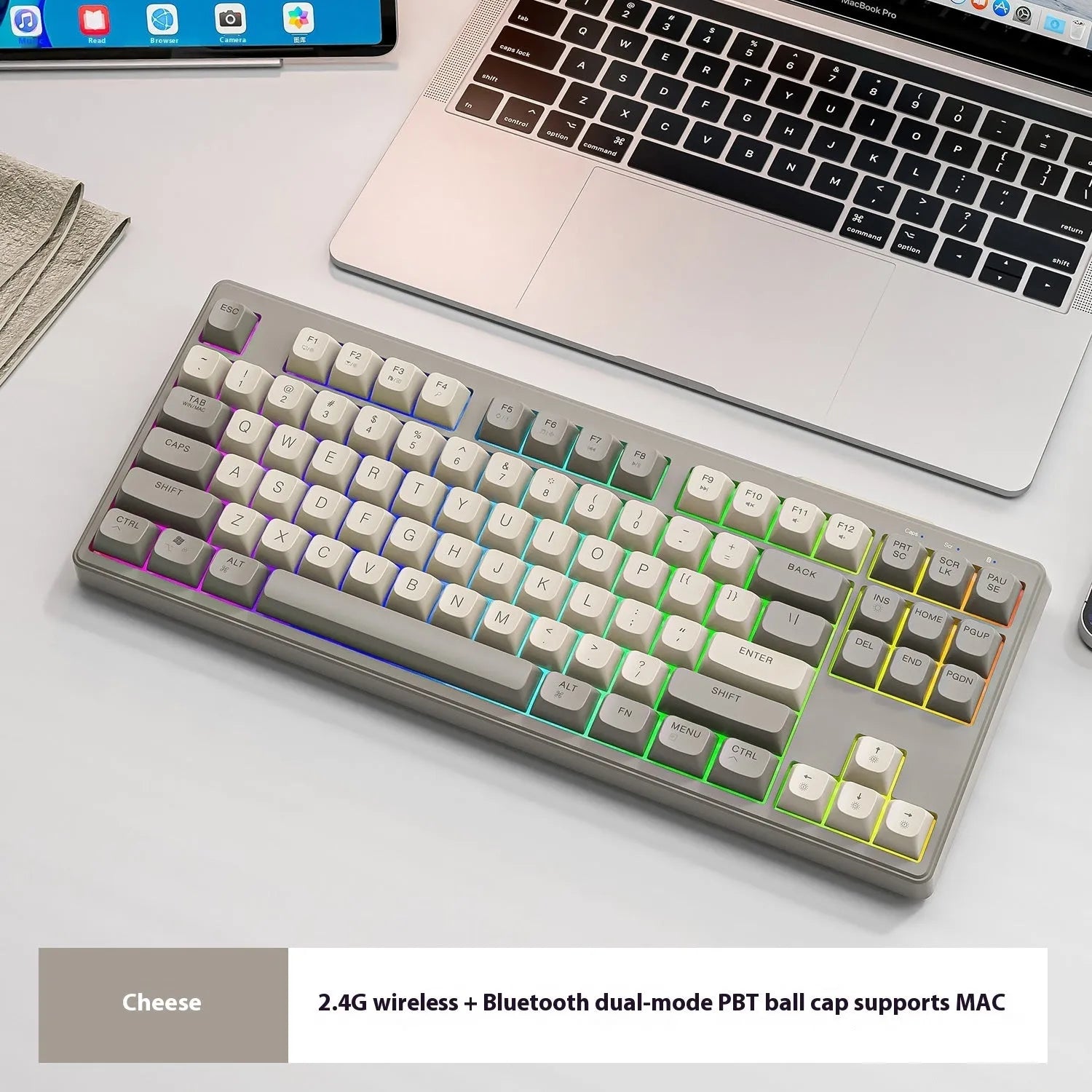 Free Wolf M87 wireless Bluetooth keyboard in blueberry colour on a desk with USB receiver and cable.