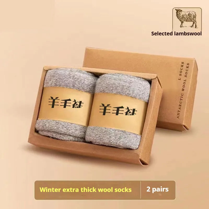 Pair of thick solid-colour wool socks with a merino midsole, shown with a storage box.