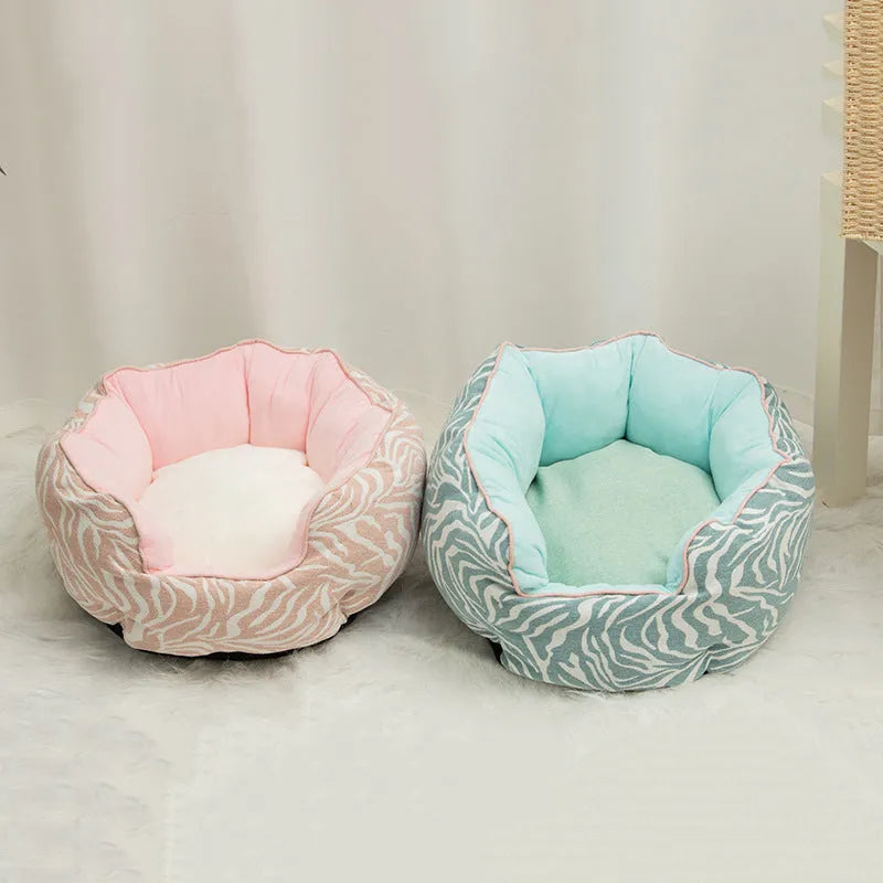 Blue octagonal pet sofa bed with a removable central mat for a small dog or cat.