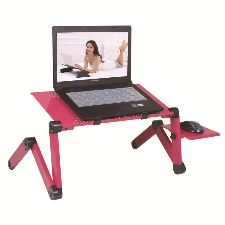 Black metal folding computer desk with a large cooling fan, shown open on a carpet.