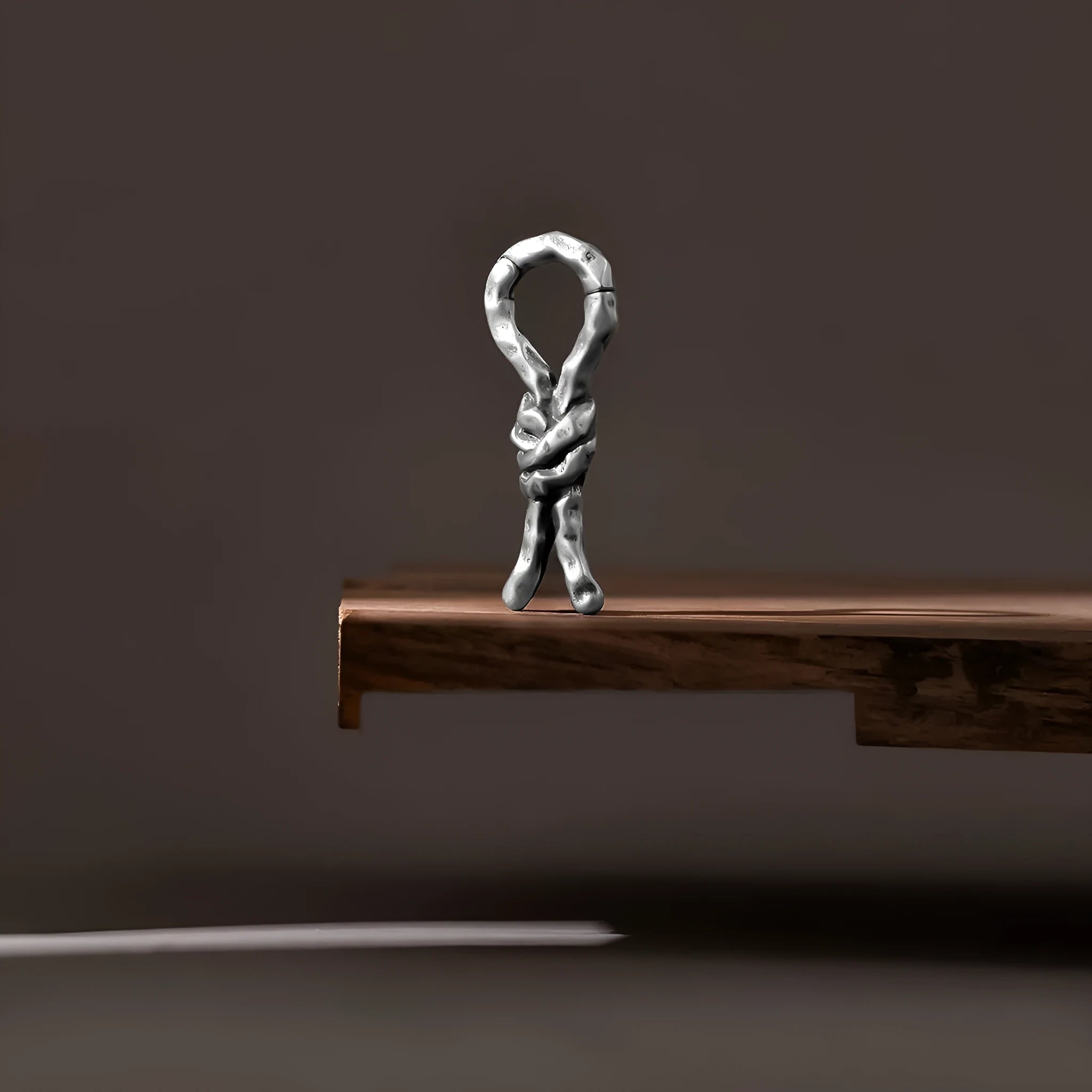 Copper Creative Bends and Hitches 4mm gauge piercing earrings with a bent design for auricle.