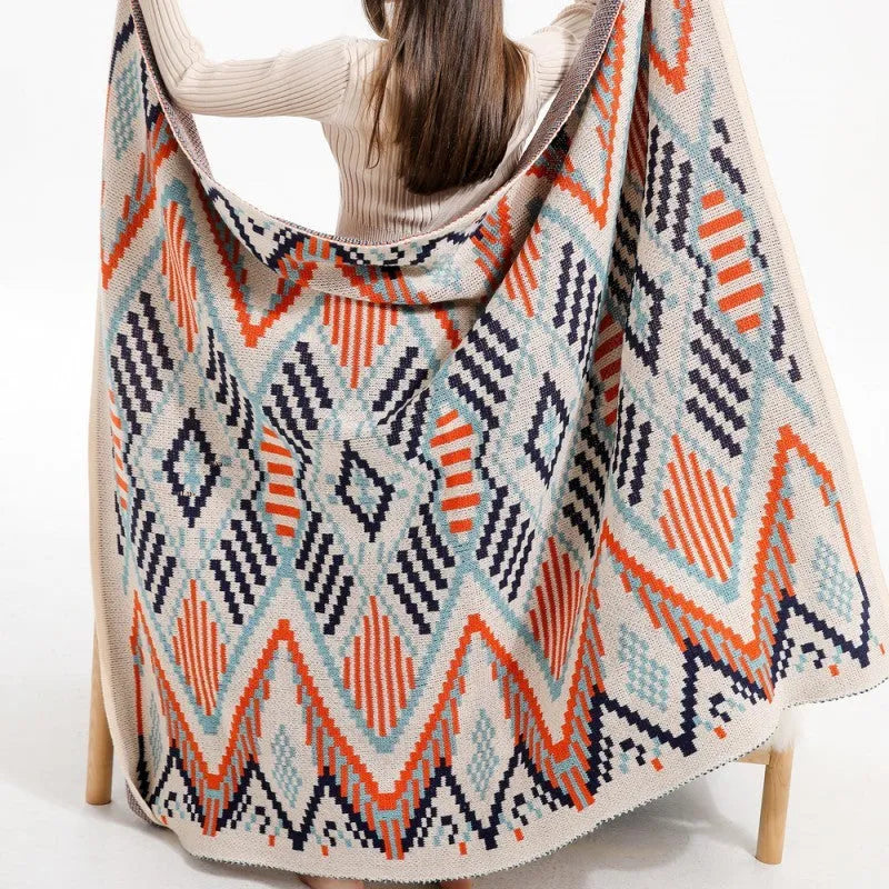 Bohemian-style acrylic sofa blanket with tassel edges in geometric pattern or solid colour options