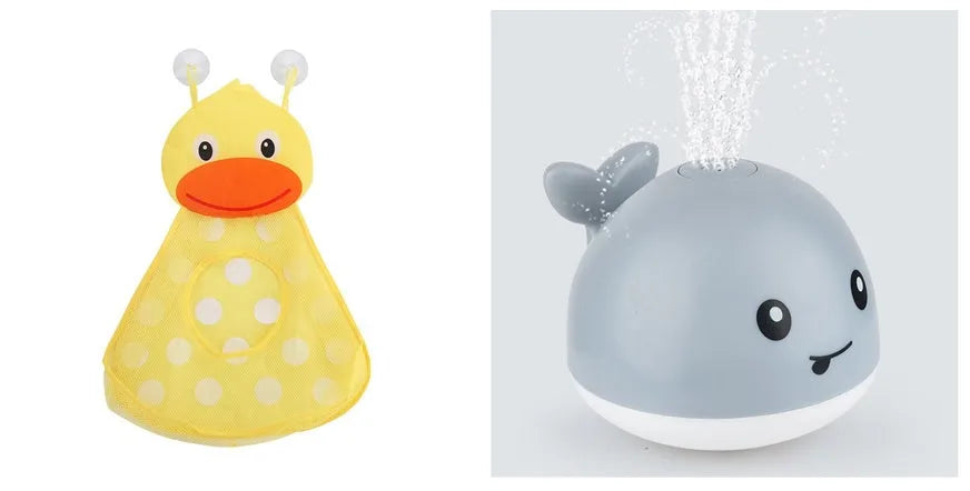 Whale-shaped electric bath toy spraying water with flashing lights, on a blue base.