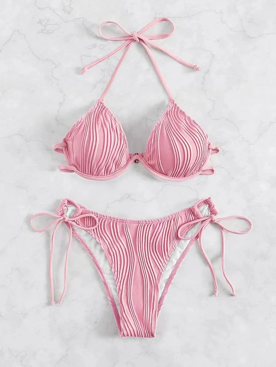 Women's apricot coloured bikini swimsuit with underwire support on a mannequin.