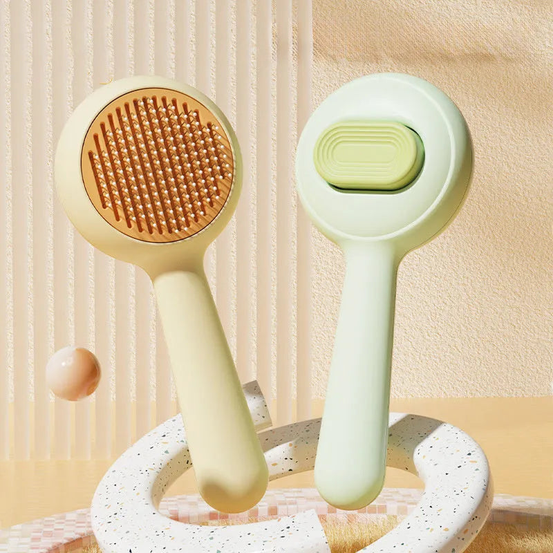 Stainless steel pet grooming brush with non-slip handle in green and yellow colour options for cats and dogs