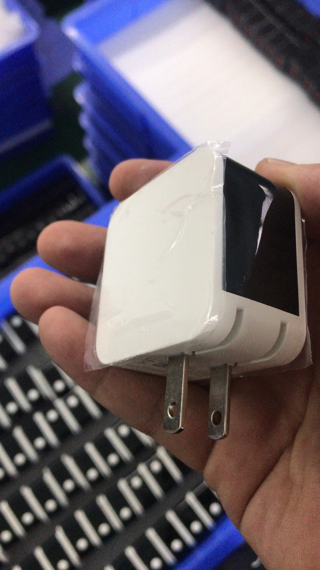 5V2A dual USB fast travel charger with digital display shown in black, next to EU and US plug options.