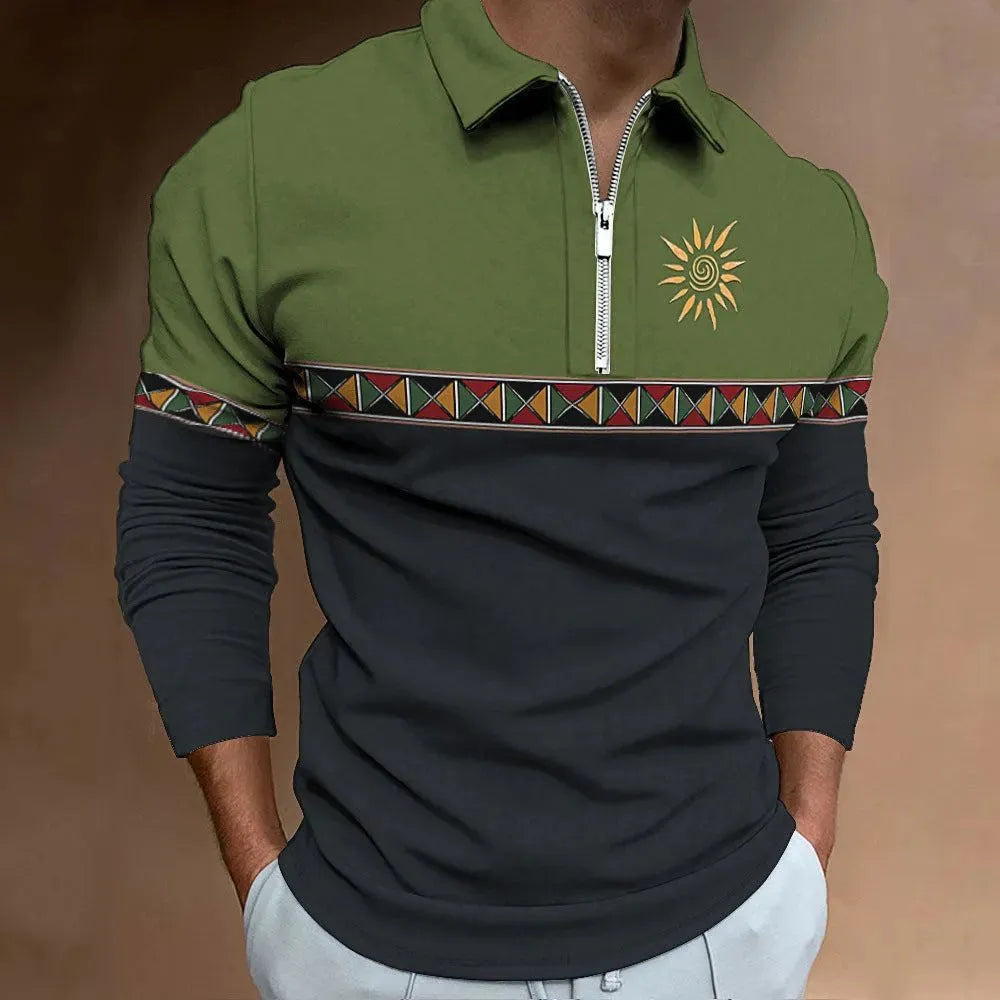 Man wearing a loose-fit, long-sleeve retro printed t-shirt with stripes and zipper decorations.