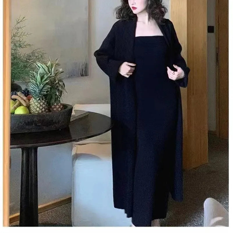 Grey women's knitted cardigan and long dress suit set with flocking detail.