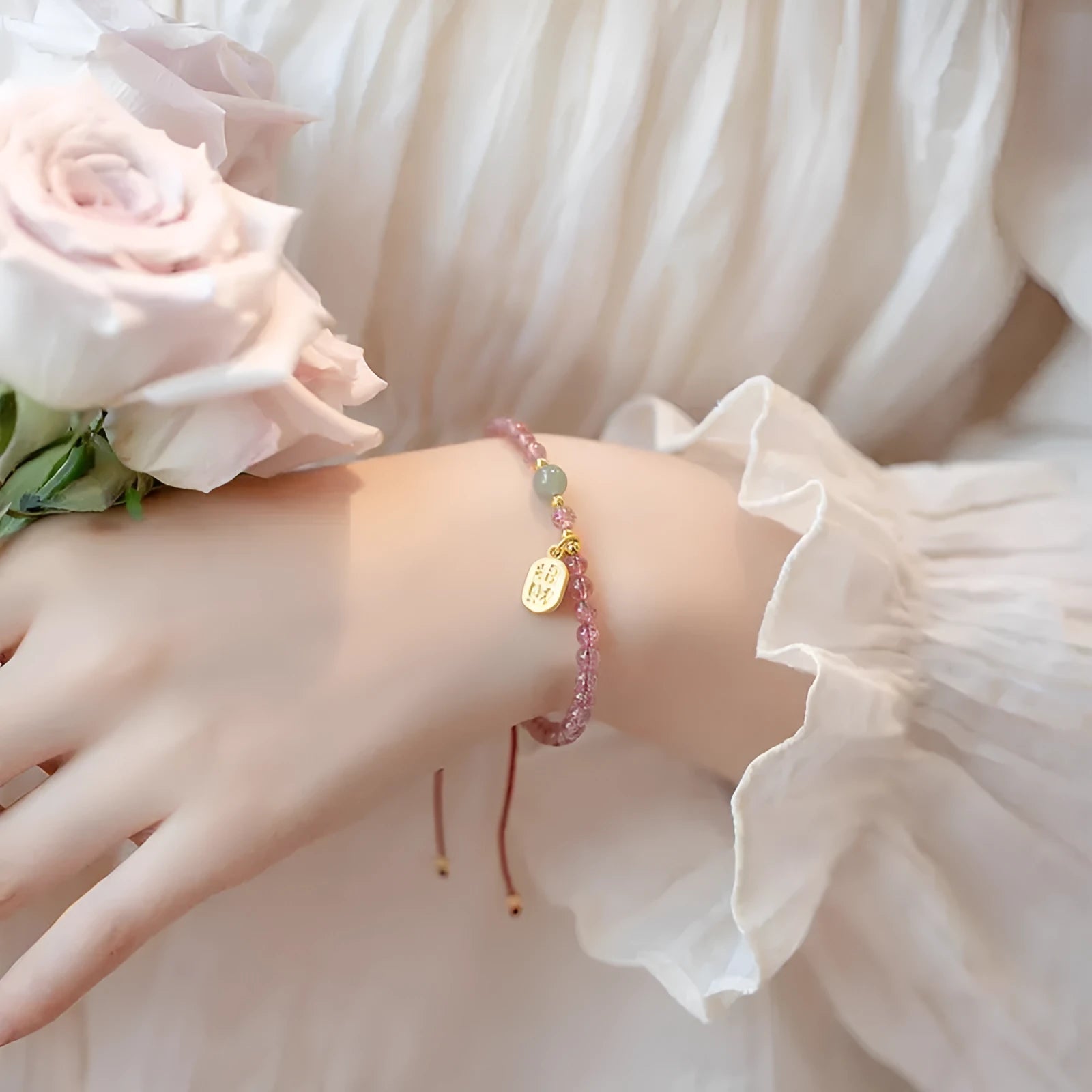 Red rope hand-woven bracelet with crystal centrepiece and adjustable wristband