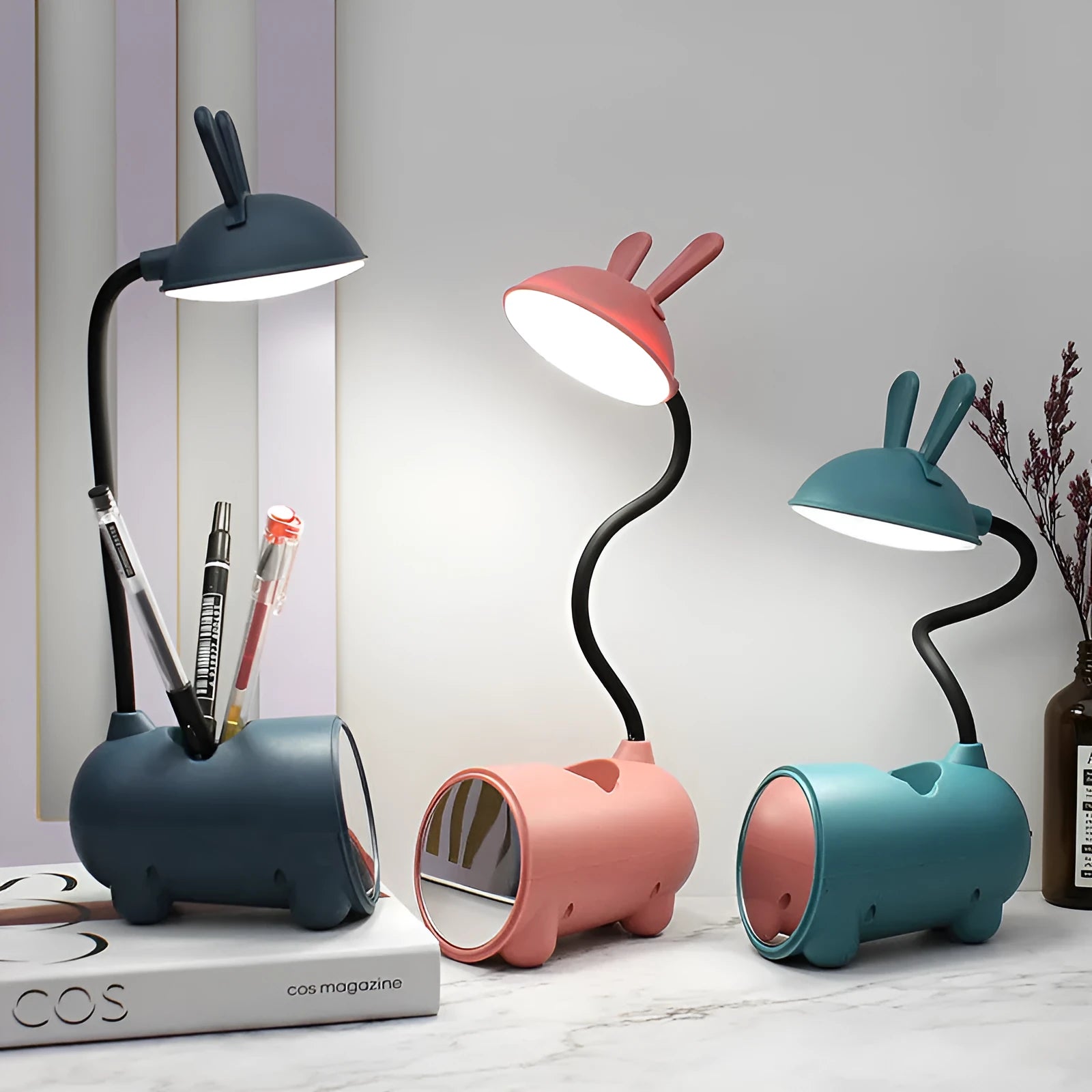 Cartoon-style USB desk lamp with integrated pen container in modern simplicity design