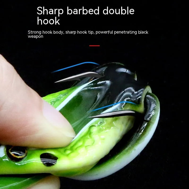Double hook frog fishing bait showing bionic thunder frog design with grass green colour and black yellow dots