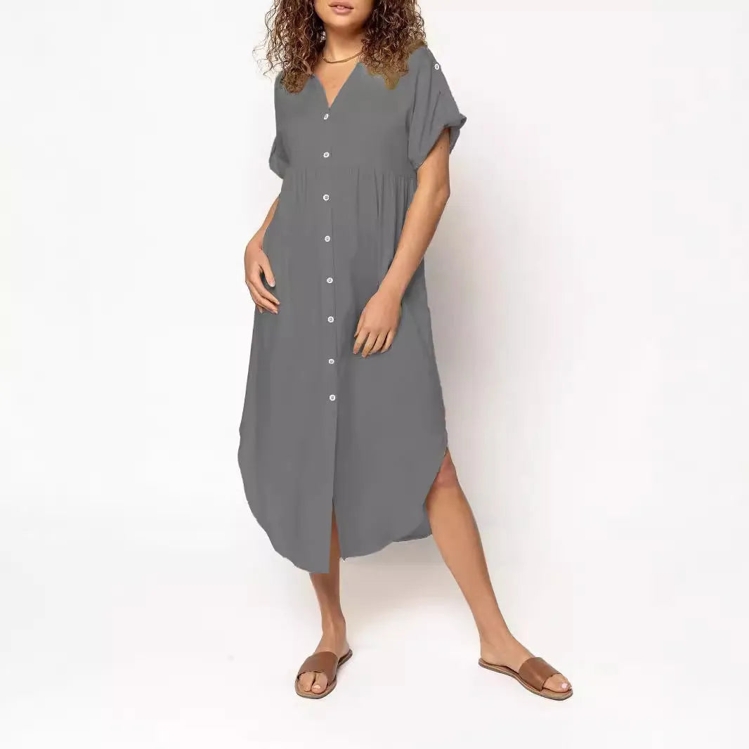 A mid-length casual dress with button detail on the front, shown in a solid colour.