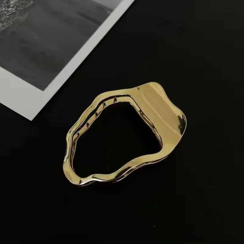 Gold and silver zinc alloy hair barrettes in square, arc, and triangle shapes.