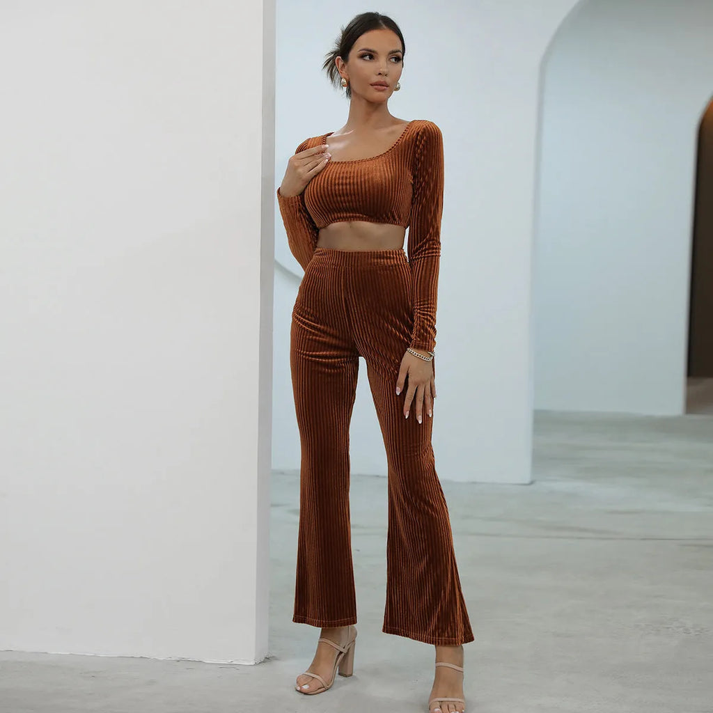 Caramel-coloured long sleeve sweater and trouser set on hanger