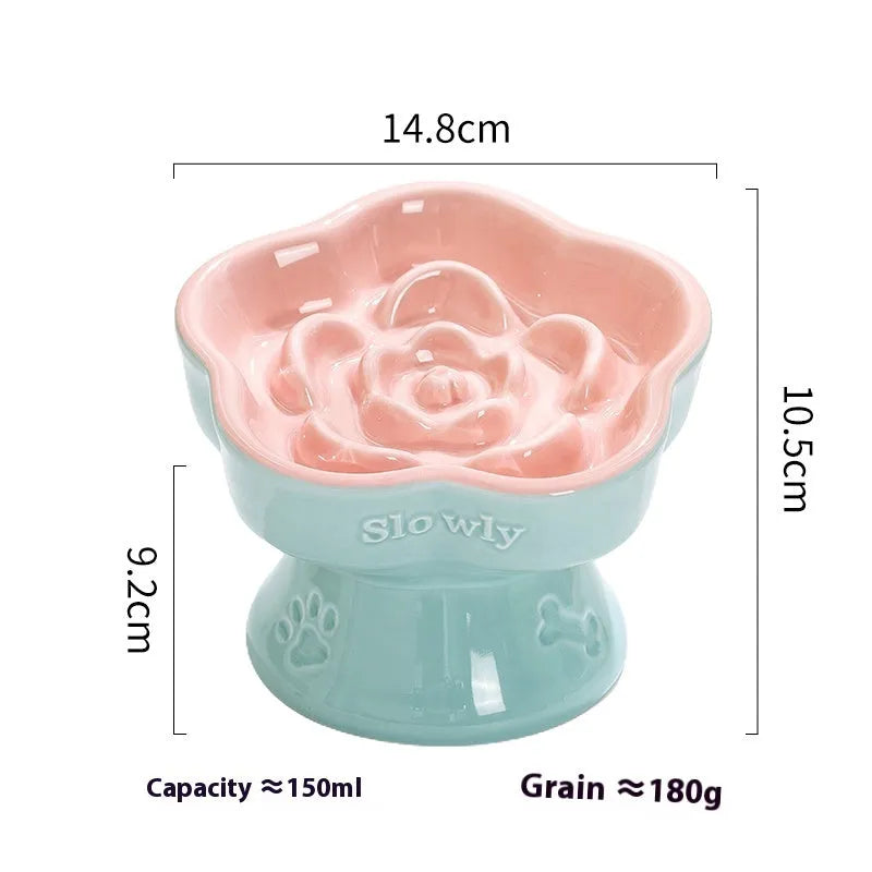Black ceramic pet bowl with a raised foot and high neck guard for dogs and cats.