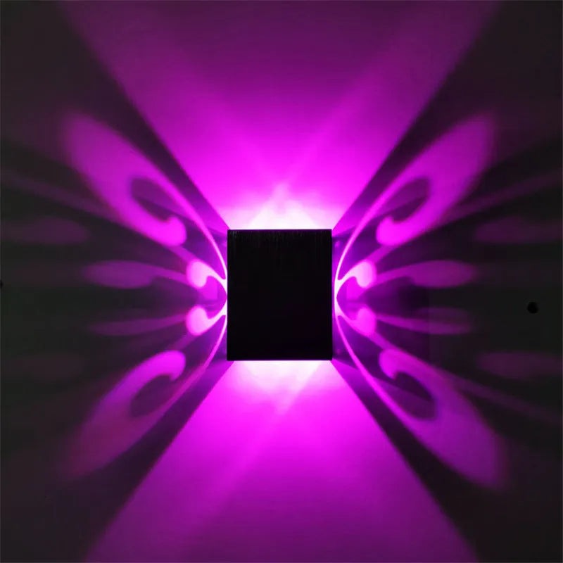 Butterfly-shaped LED wall lamp with aluminium shade in modern style