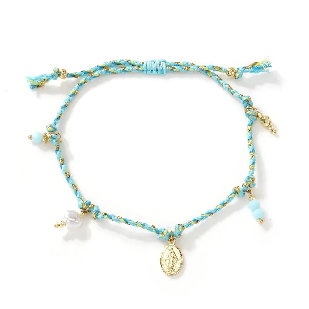 A colourful hand-woven braided rope bracelet with an adjustable strap and tag charm.
