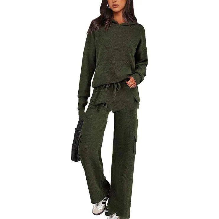 Women's two-piece polyester leisure suit in a solid colour, showing long sleeves and full-length trousers.