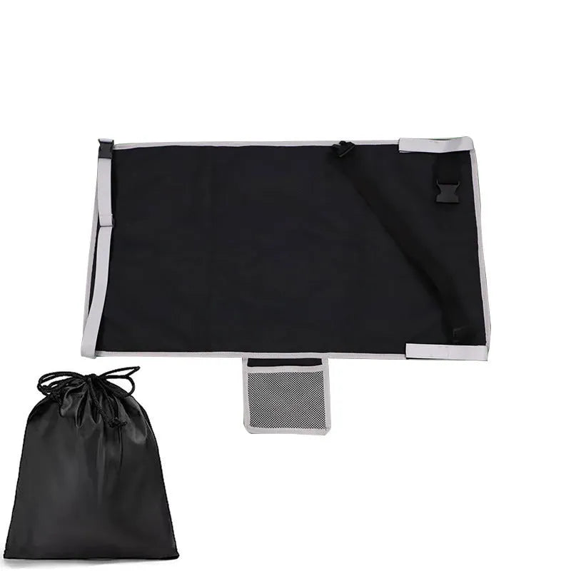 Blue portable children's aircraft seat extender with attached pedal and matching drawstring storage pocket.