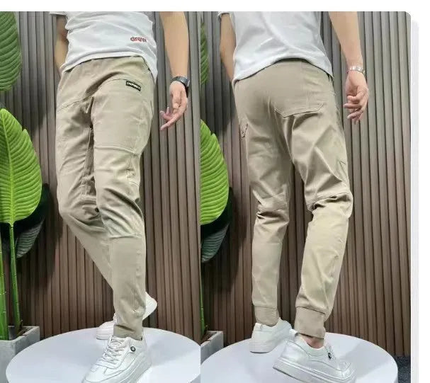 Men's ice silk stitching six-pocket high elastic casual pants in khaki colour
