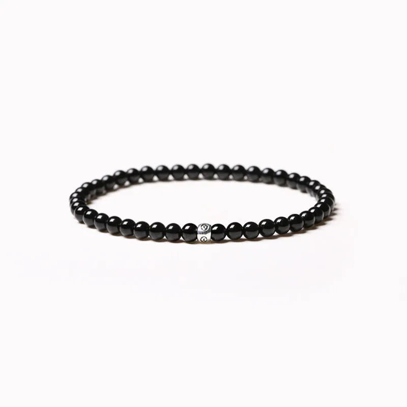 Geometric agate bracelet with mixed 4mm stones including obsidian, blue San, and black agate varieties