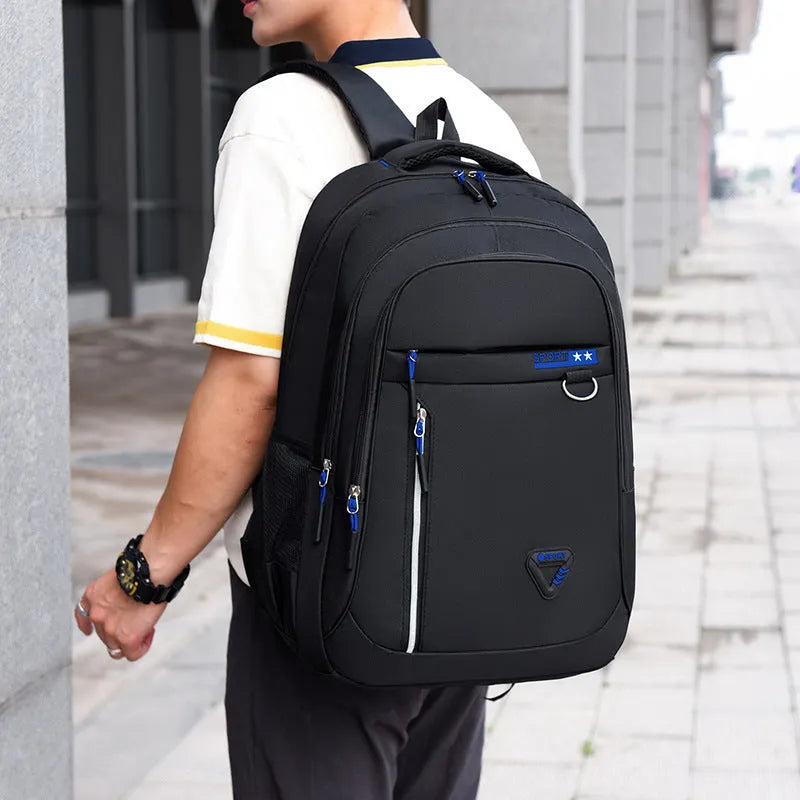 Men's Oxford cloth schoolbag in red colour with letter pattern and air pillow burden reduction belt