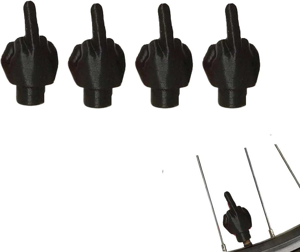 Eight car tyre valve dust caps showing four black and four skin colour latex pieces