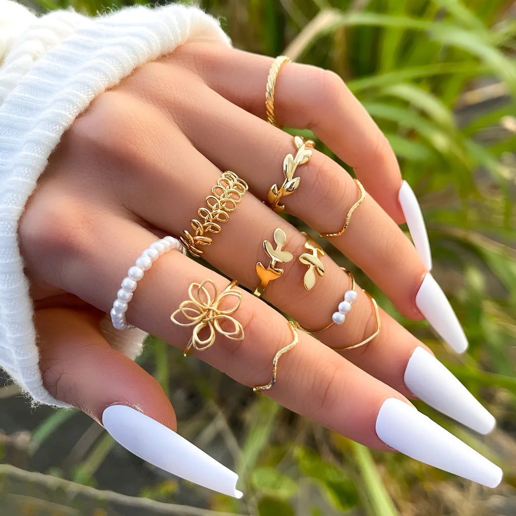 Gold openwork flower ring set for women with intricate floral designs