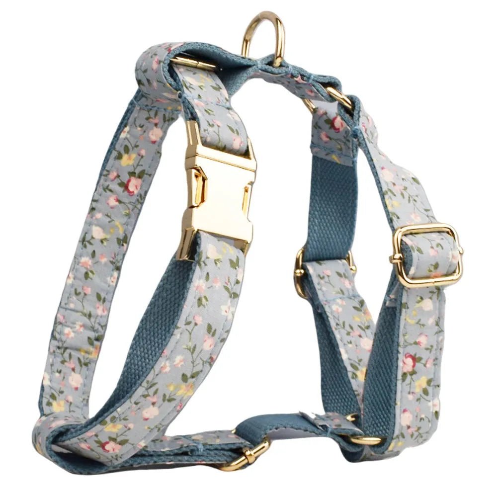 Blue floral polyester cotton dog collar set with matching leash, bow tie and vest accessories