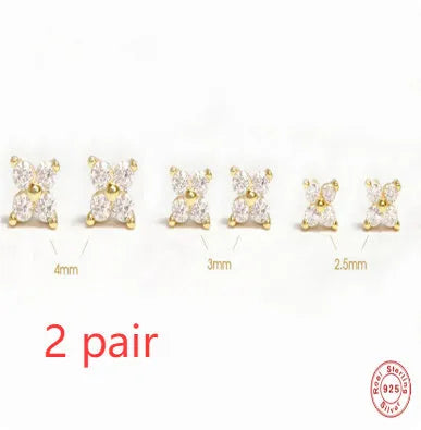 S925 sterling silver stud earrings with a small crystal flower design in gold or platinum plating.