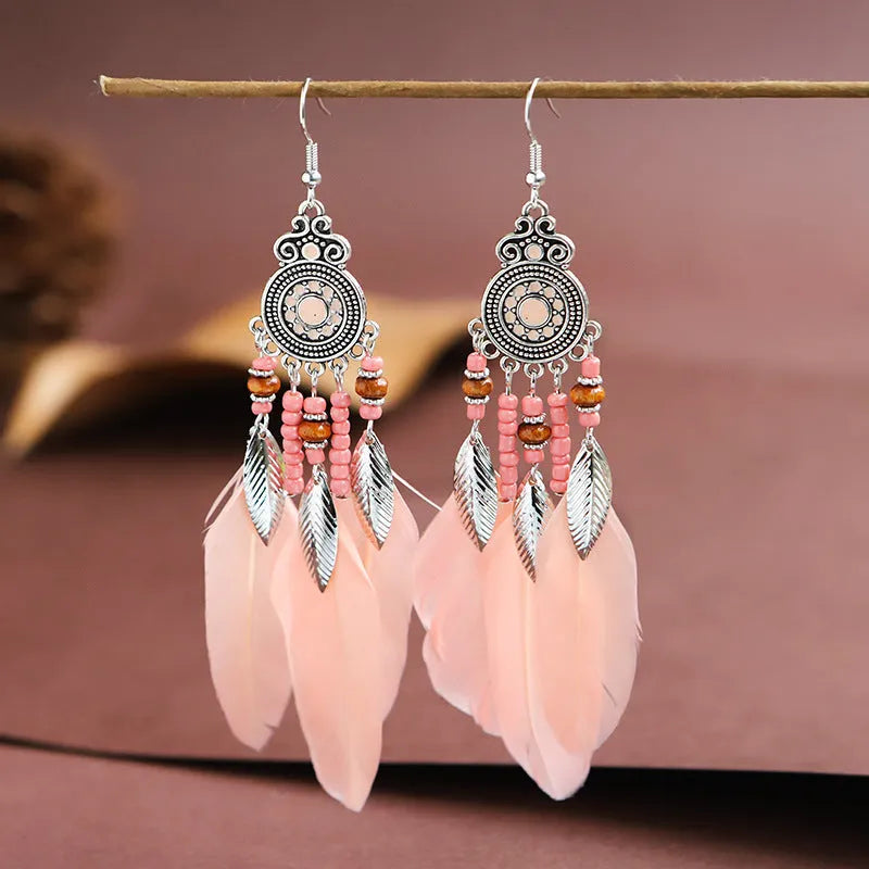Feather pattern drop earrings with round oil craft design in alloy with electroplated finish