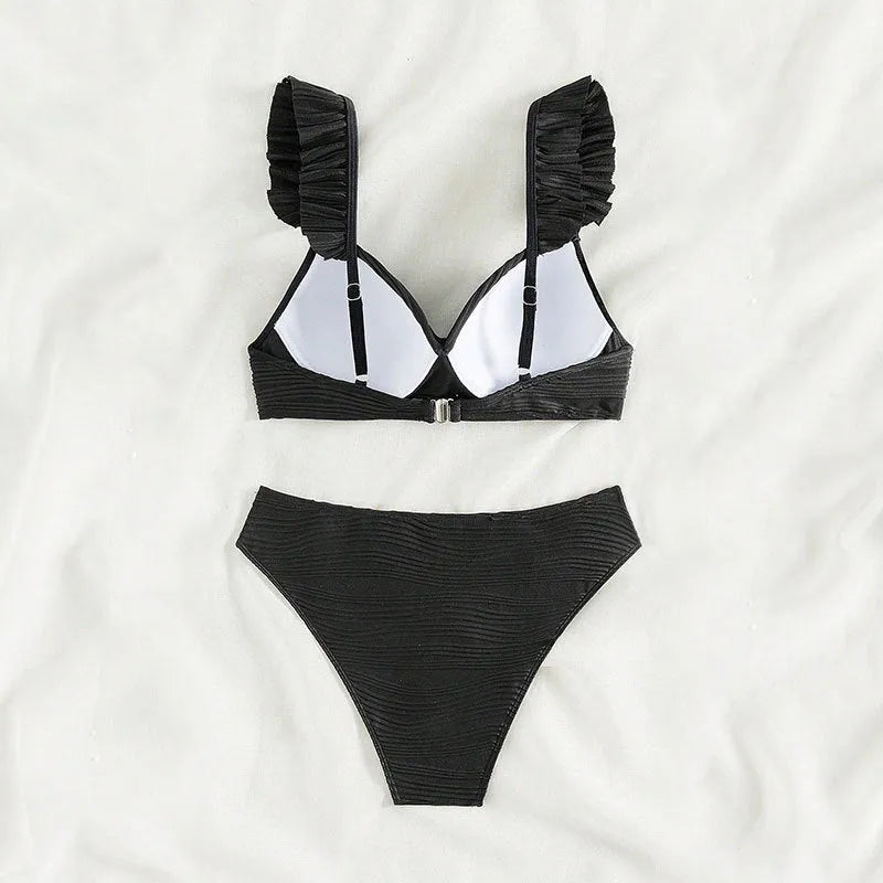 Solid black and khaki women's two-piece bikini swimsuit on hanger
