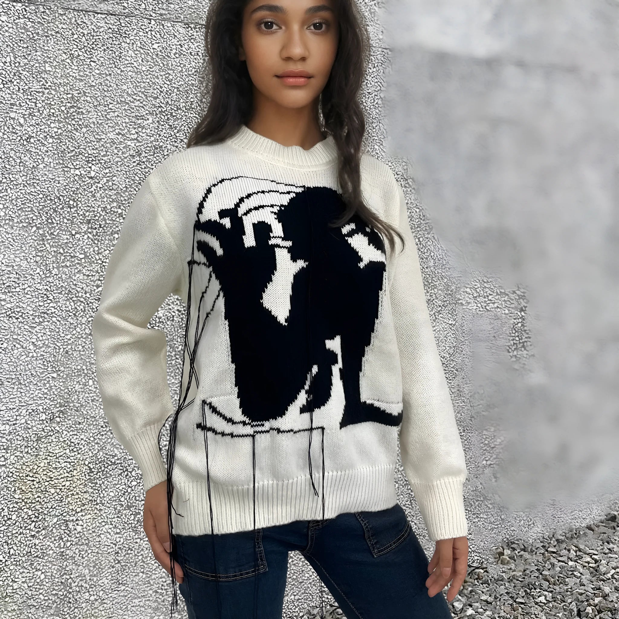 Women's grey alpaca wool sweater with abstract tassel design and round neck