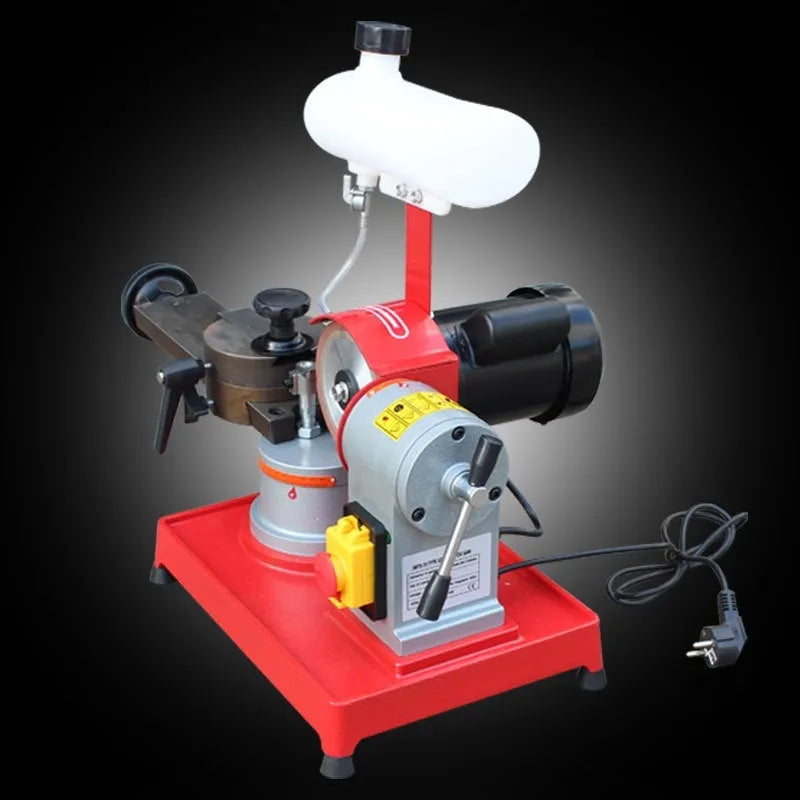Manual gear grinding machine for sharpening alloy circular saw blades on a workshop bench.