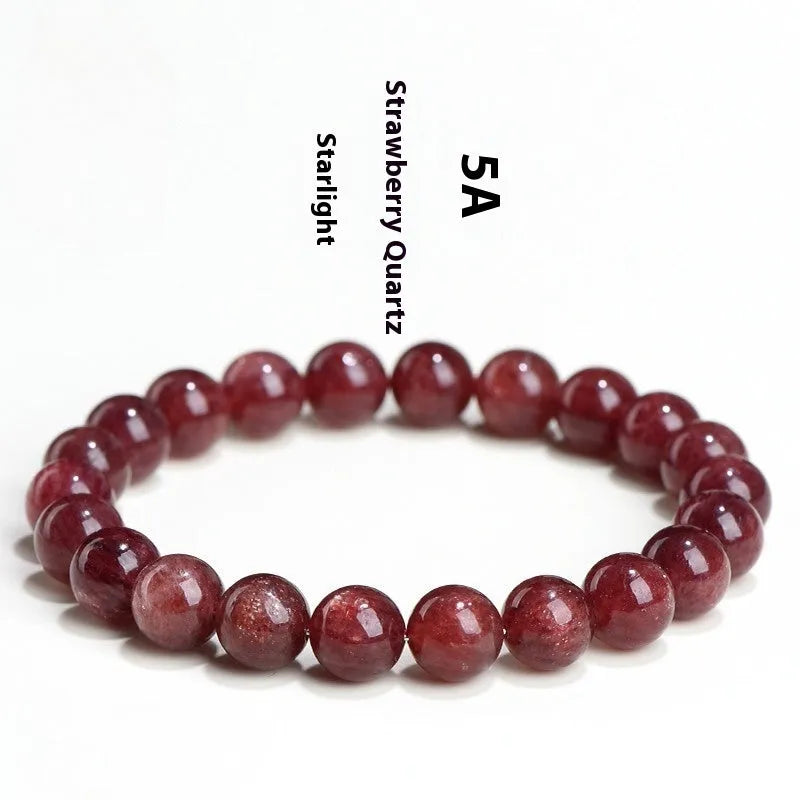 Natural cherry red strawberry quartz bracelet with geometry-shaped beads on a white background.
