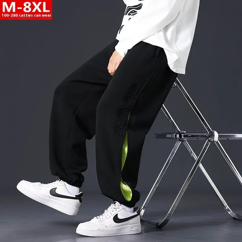 Men's loose fit trousers with stitching printing detail and banded ankle cuffs in micro elastic cotton fabric