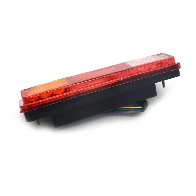 Black integrated shell electric tricycle taillight with dimensions 200mm by 70mm