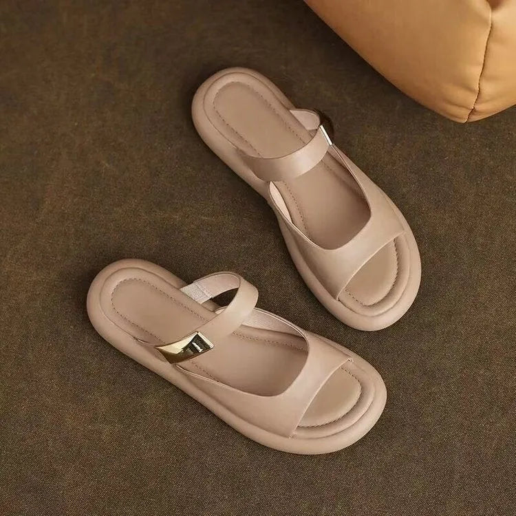 Women's peep toe flat sandals in soft leather with rubber platform sole in apricot colour